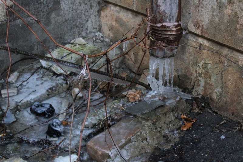 a frozen gutter drain